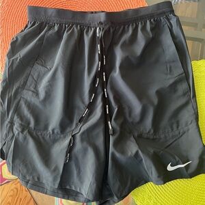 3 pairs of small nike running shorts
